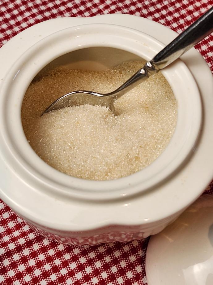 Raw Sugar in a white sugar bowl