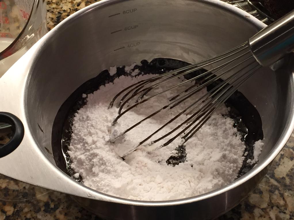 Adding Powdered Sugar to Cocoa Mixture